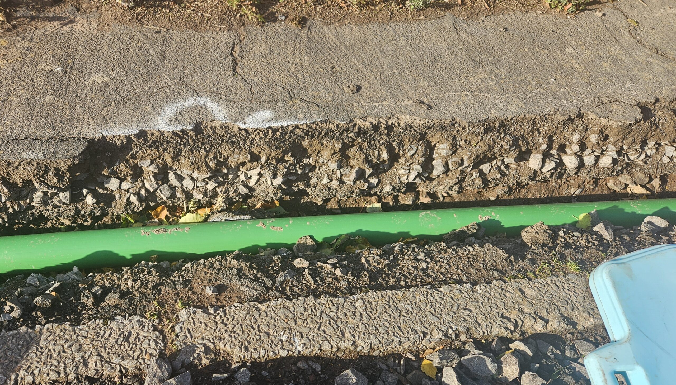 Go Fibre roadworks, green pipe in trench
